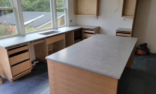 Light grey honed quartz countertop installed by Crowley's Granite