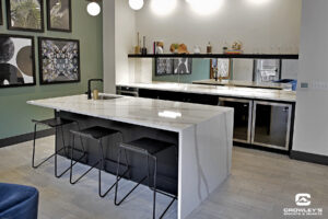 contemporary kitchen keeping with current trends in countertops, quartz countertop in sage green room with modern decor