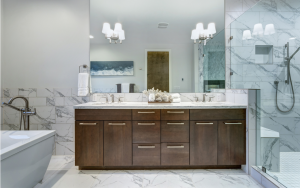 Bathroom remodel with large vanity and stone countertop