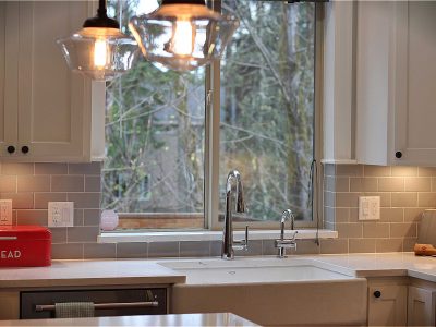 modern kitchen with white quartz countertops